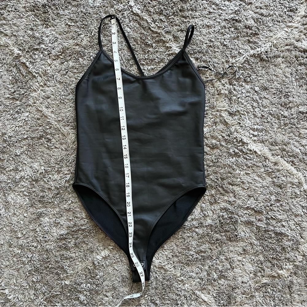 Pleather look strappy bodysuit black.